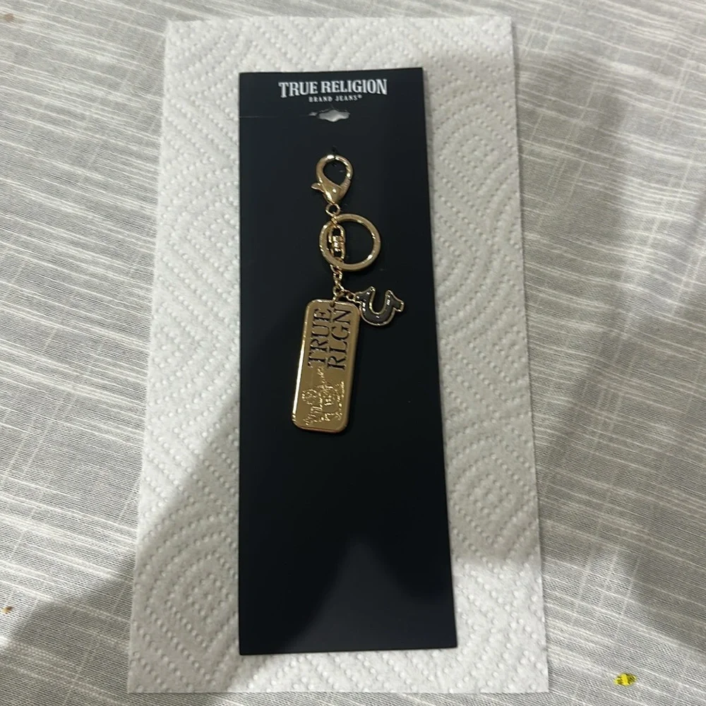 True Religion Gold and Black Keychain NEW
